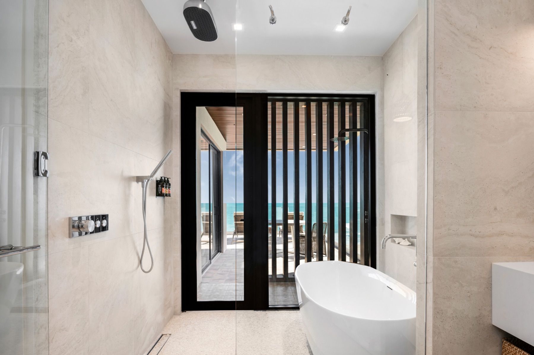 Ensuite with  tub, shower, and outdoor shower.
